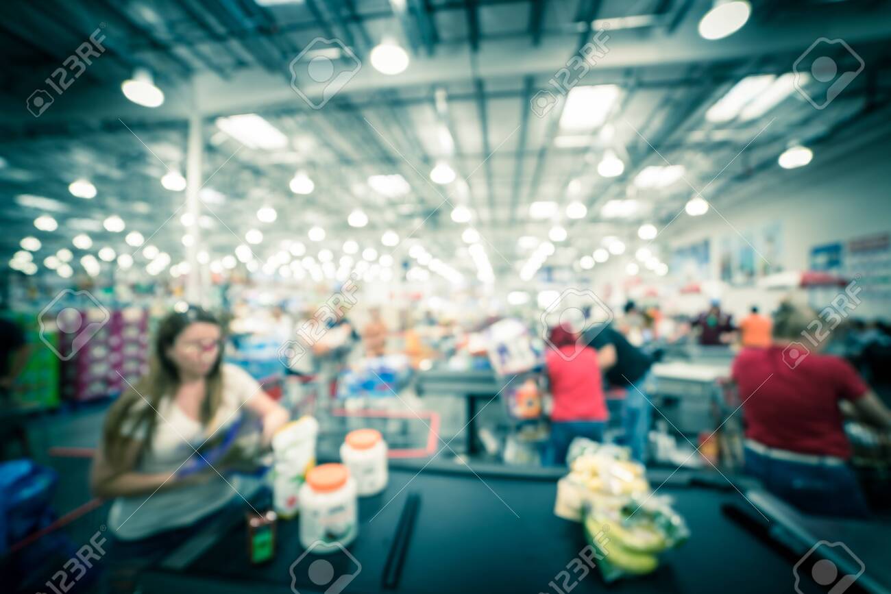 Filtered Image Blurry Background Busy Checkout Line At Wholesale