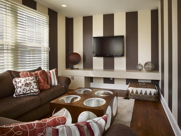 Living room with brown and white stripe wallpaper design