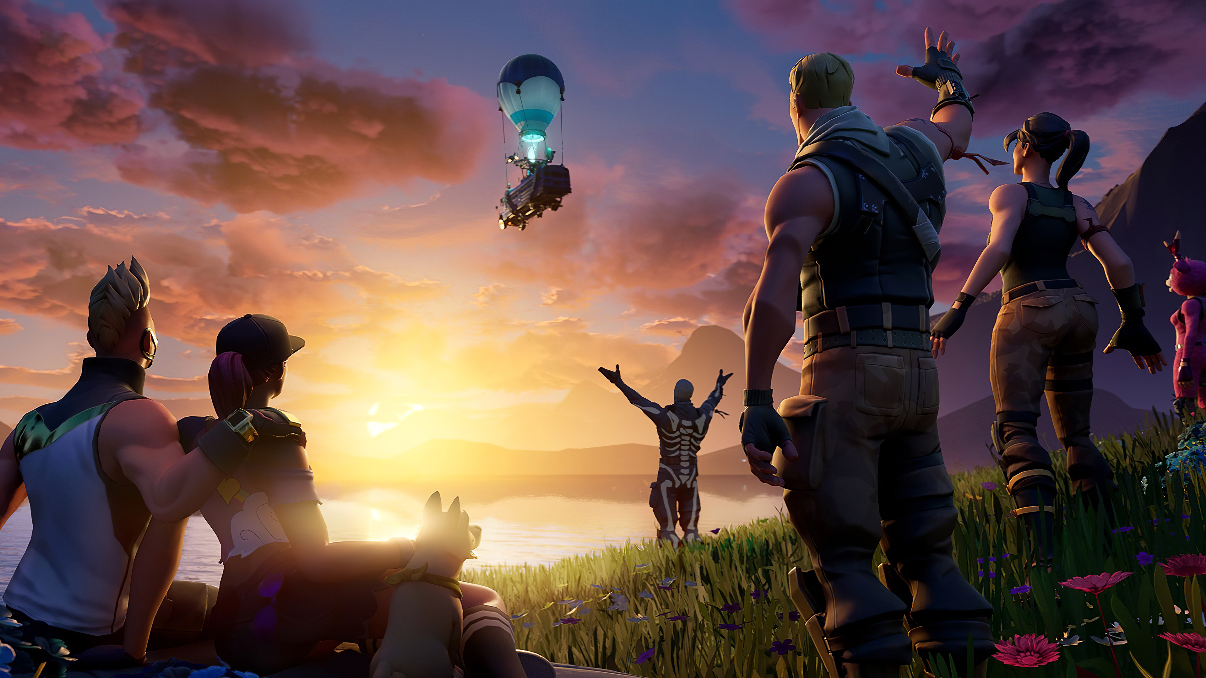 Fortnite characters silhouetted against a vibrant sunset with a hot air balloon in the background