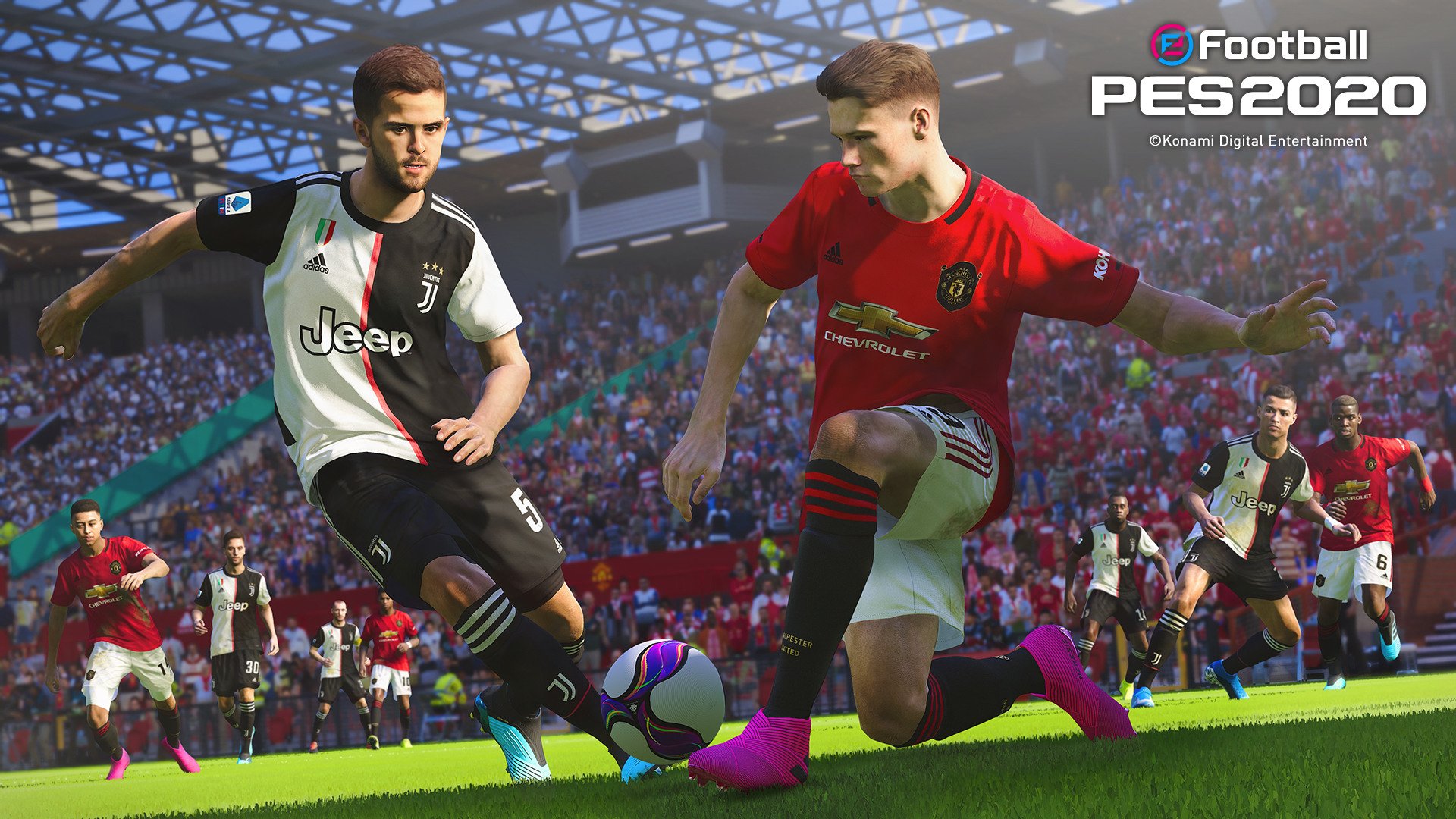 Two football players from Juventus and Manchester United competing for the ball in PES 2020
