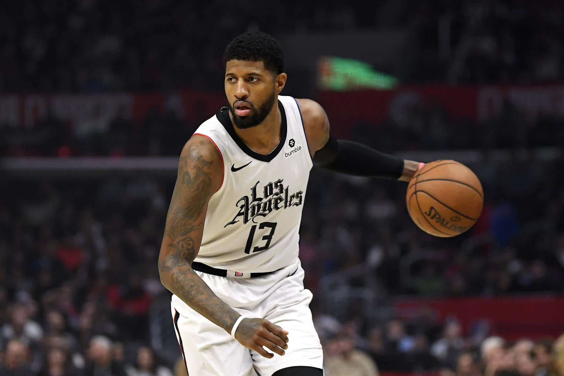 Paul George Of Los Angeles Clippers In Action Wallpaper