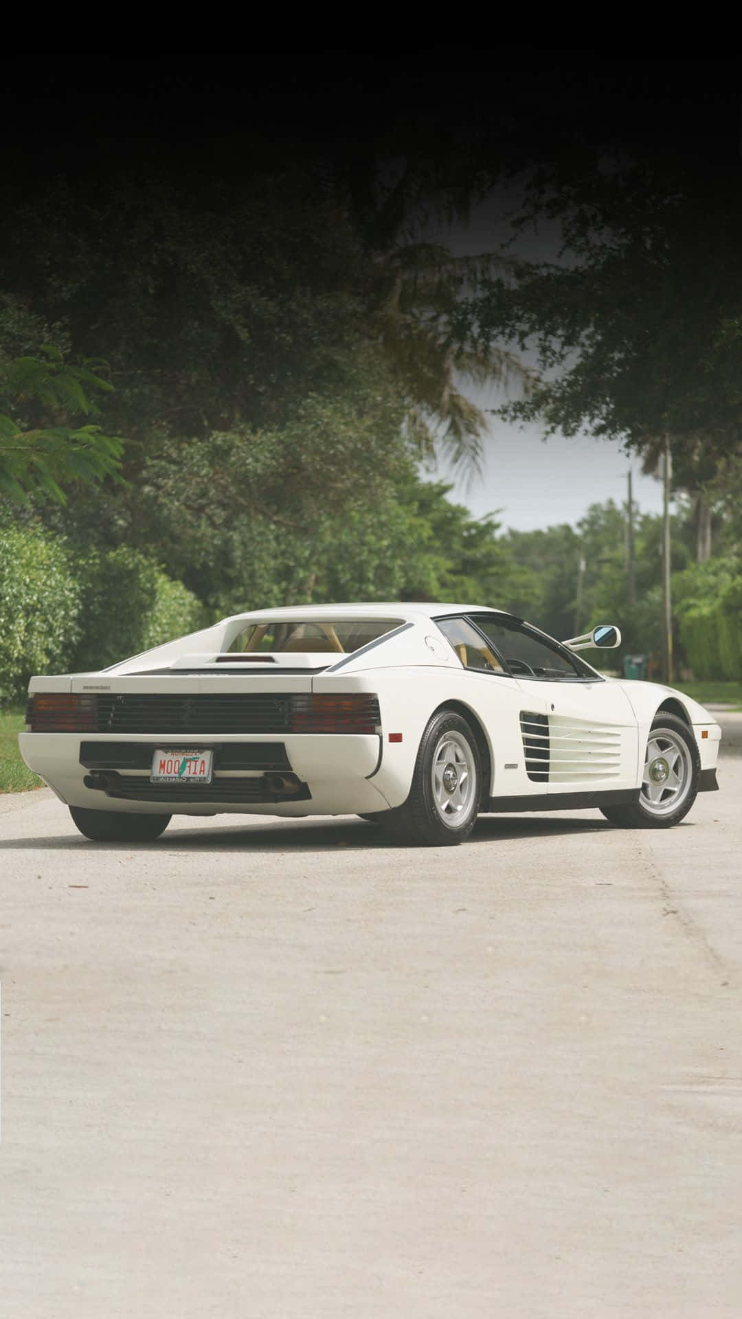 Cruising Down The Open Highway In A White Ferrari With Your Wallpaper