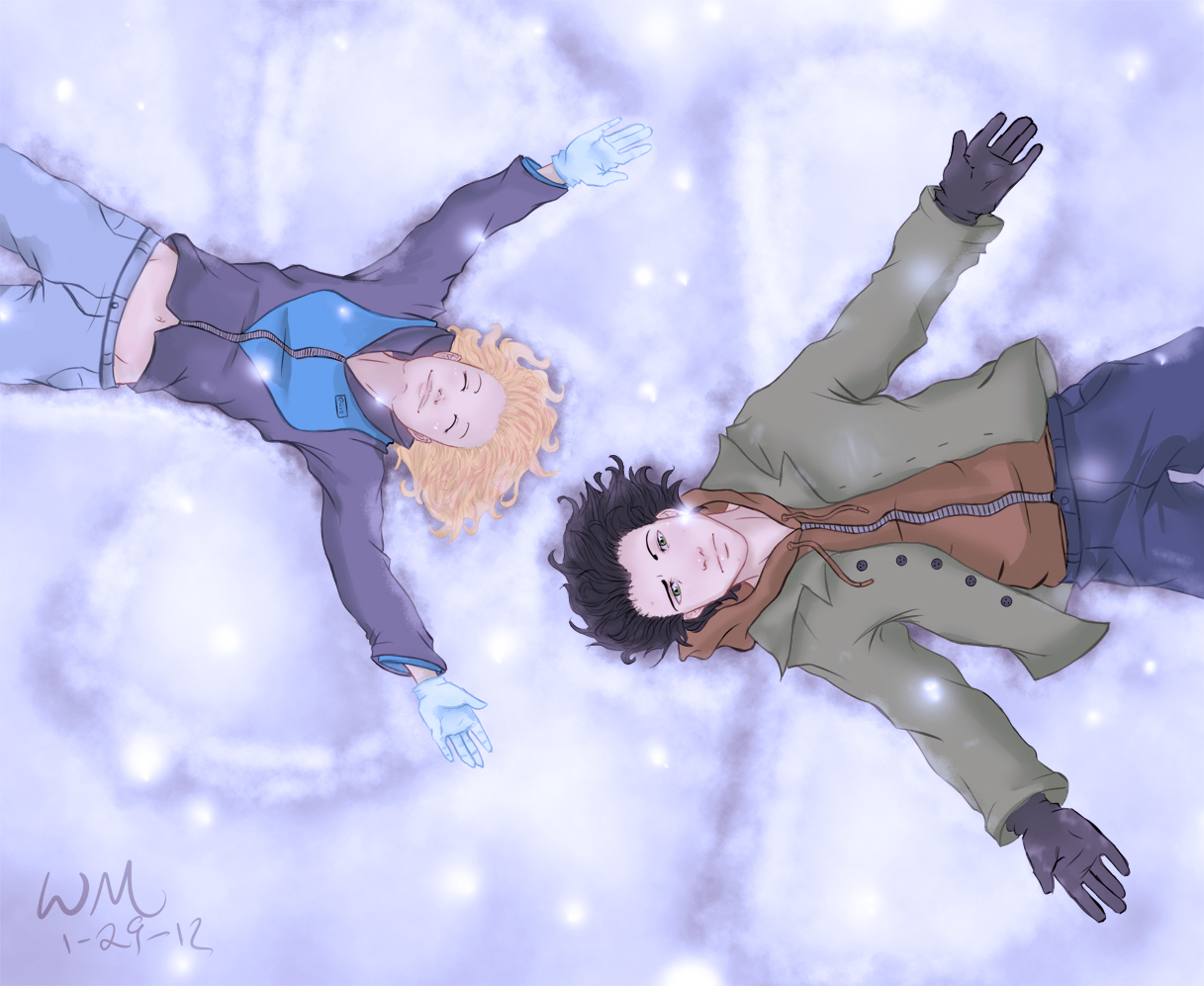 Two people making snow angels in fresh snow, viewed from above
