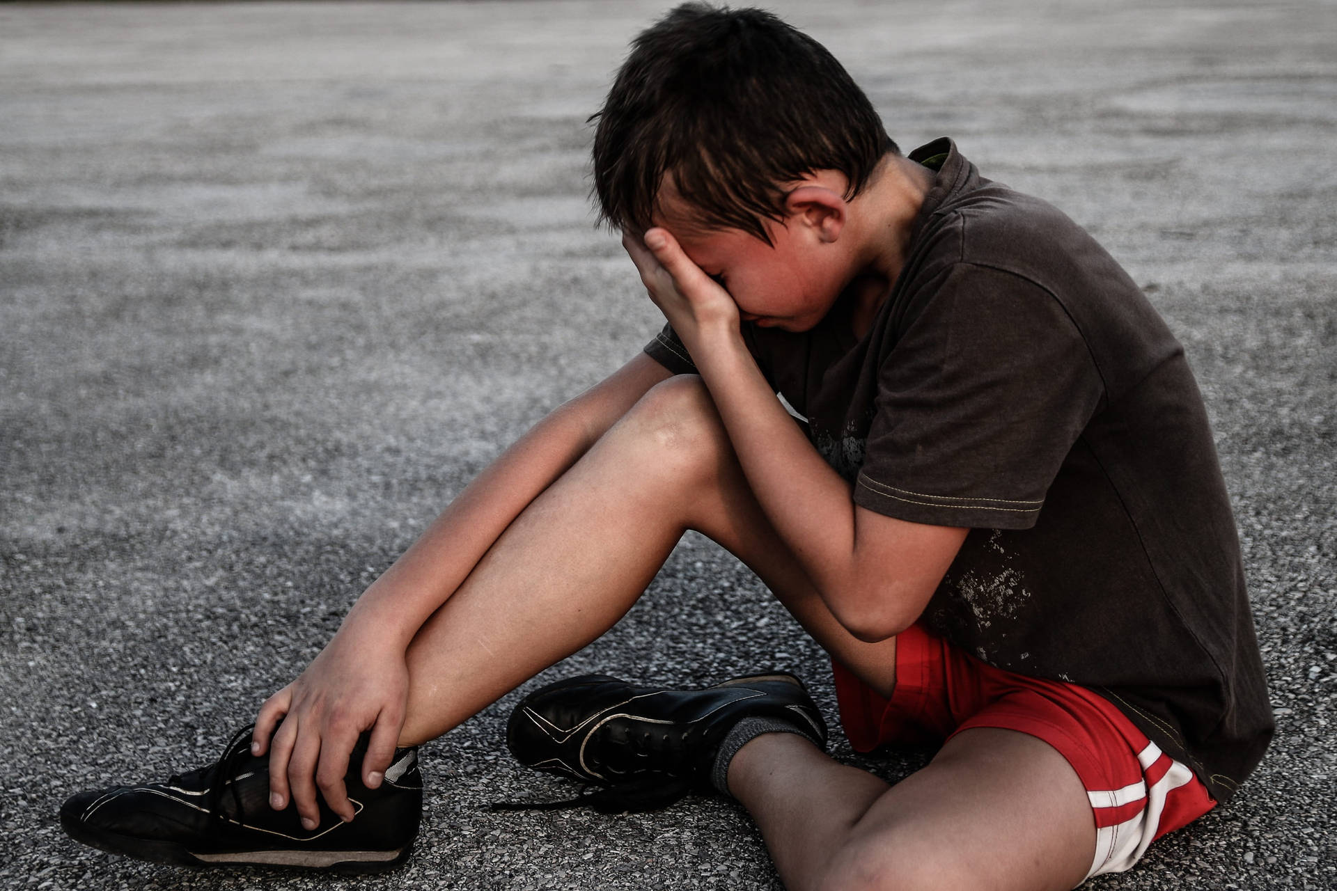 Crying Sad Boy Side Angle Wallpaper