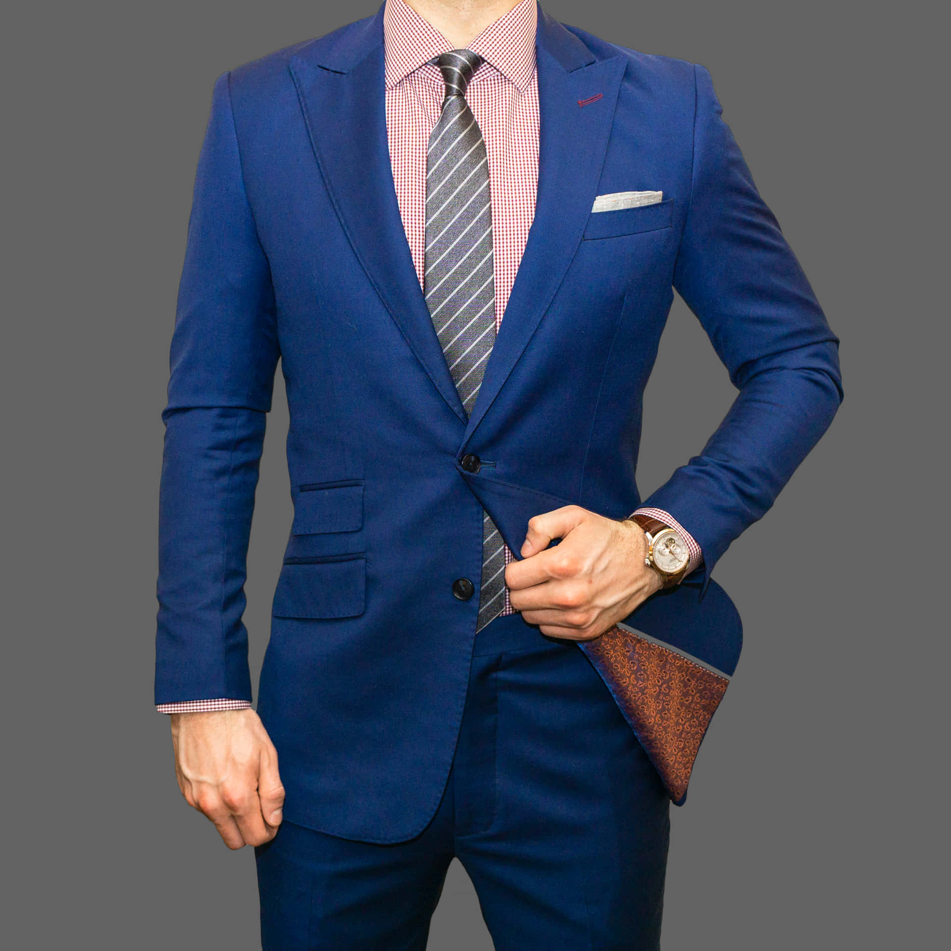 Captivating Elegance In A Blue Men S Suit Wallpaper