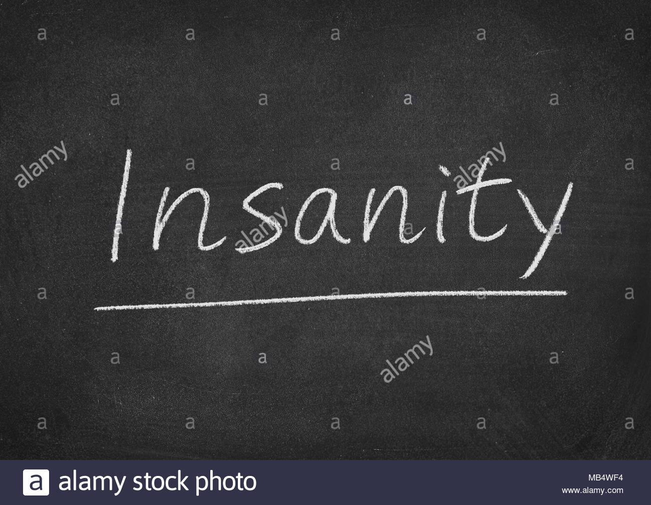 Free download insanity concept word on a blackboard background Stock