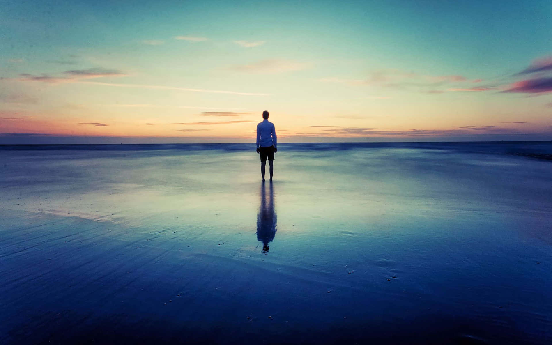 Cool Sad Boy Standing In Water Wallpaper