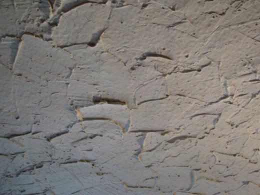You can vary the look of hand plastering depending on how much plaster
