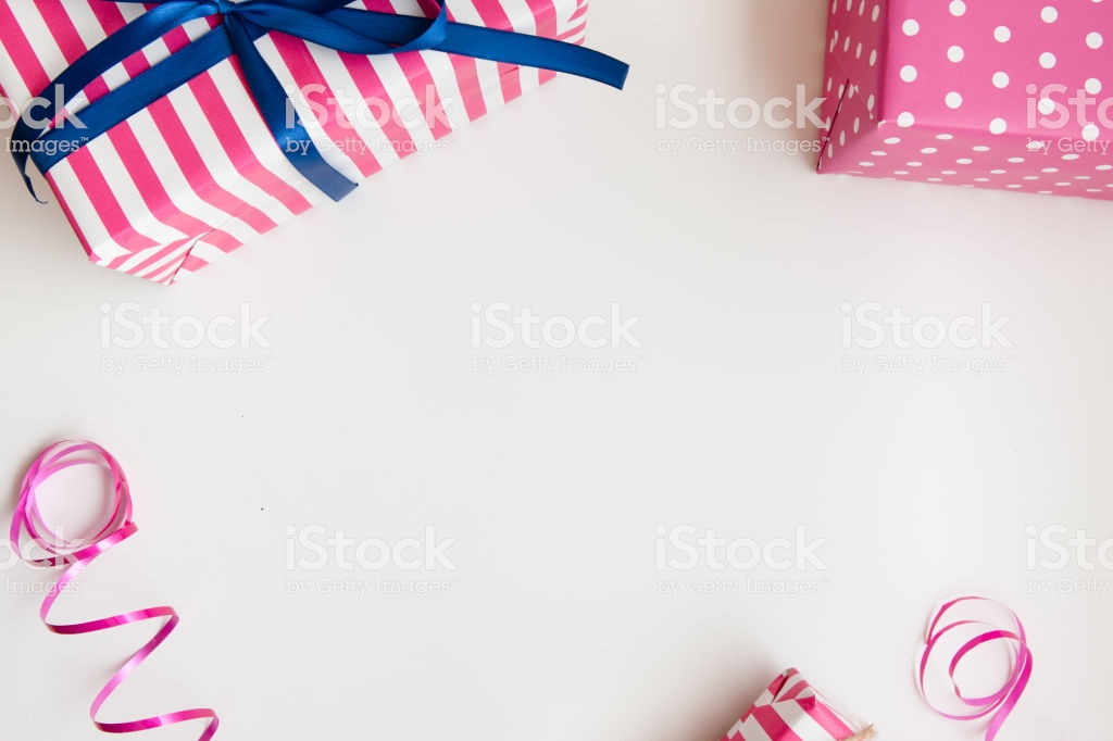 Pink Gifts On White BirtHDay Background Stock Photo