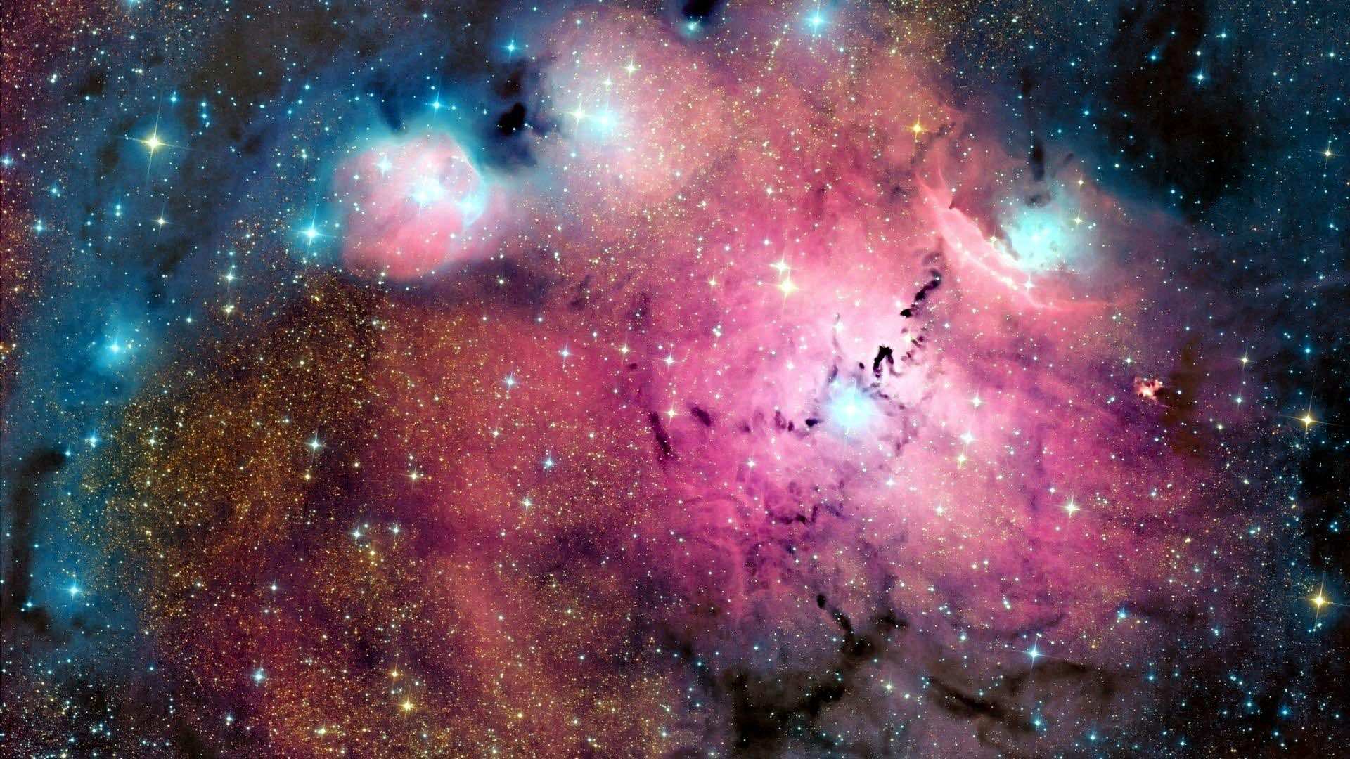 Vivid and colorful nebula with sparkling stars, captured in high definition. Perfect for a galaxy wallpaper