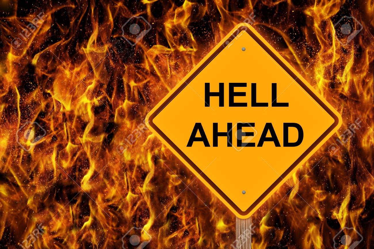 Hell Ahead Caution Sign With Flaming Background Stock Photo