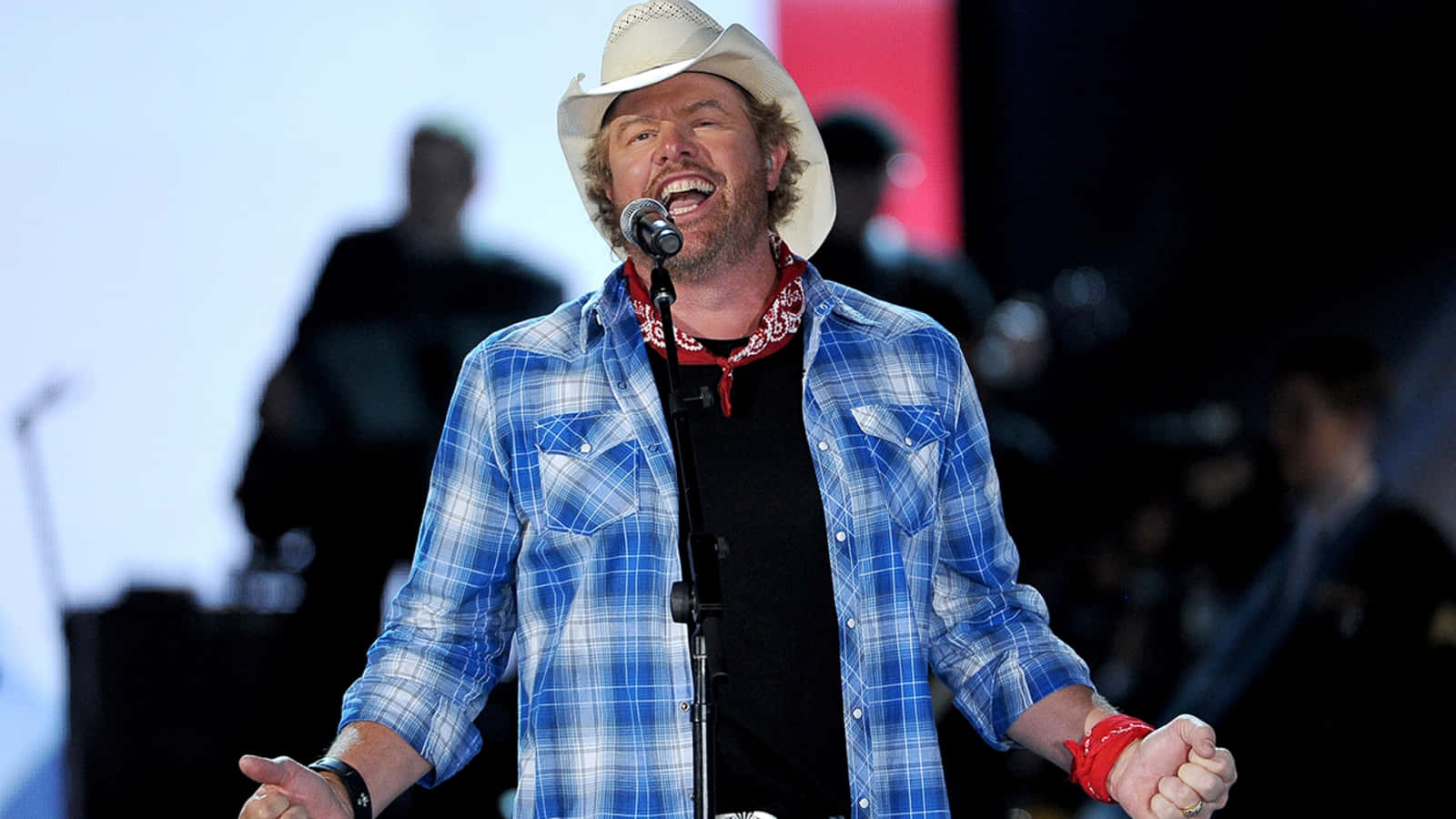 Country Singer Performance Moment Wallpaper