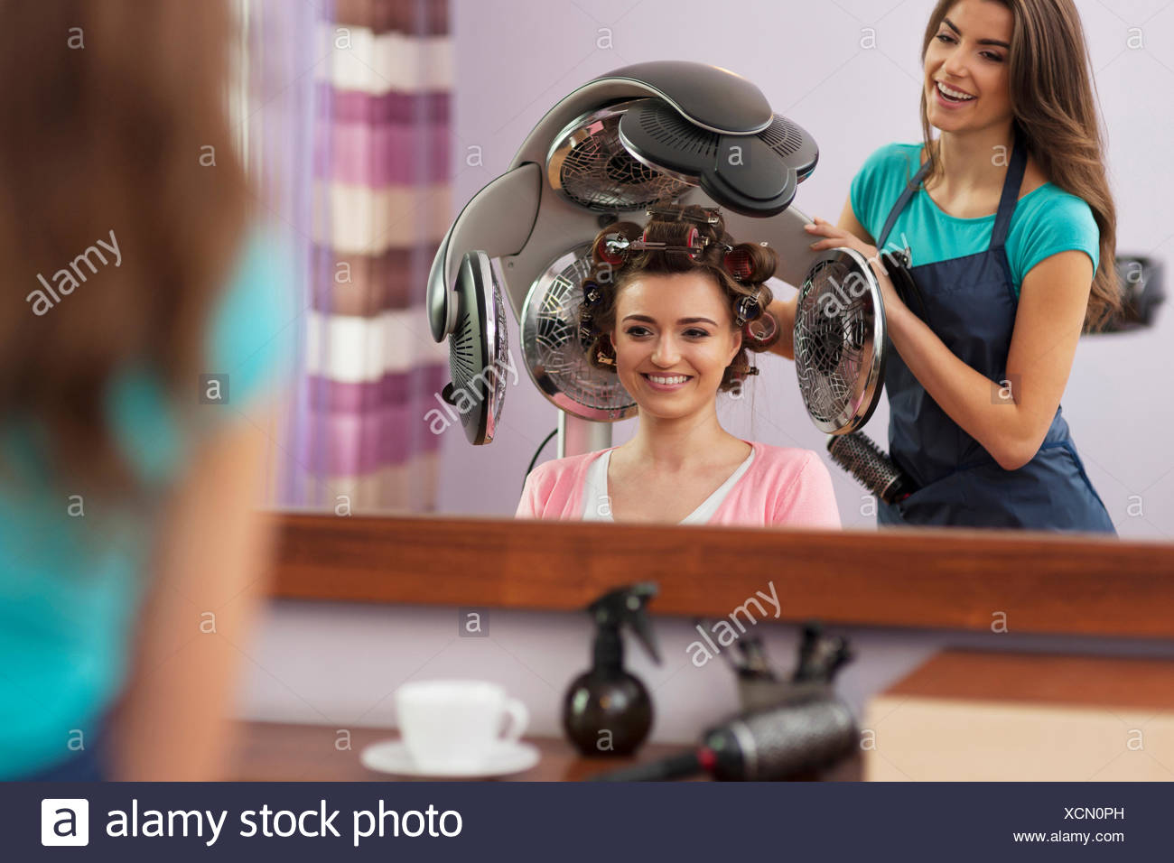 Woman Under Hair Dryer Stock Photos