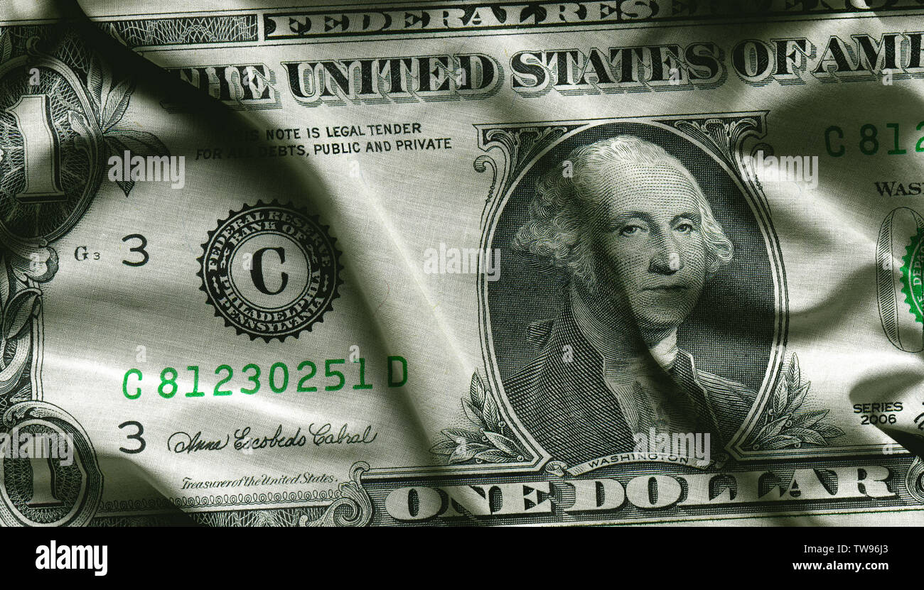 Close Up Of One Dollar On Waving Fabric Background Wallpaper
