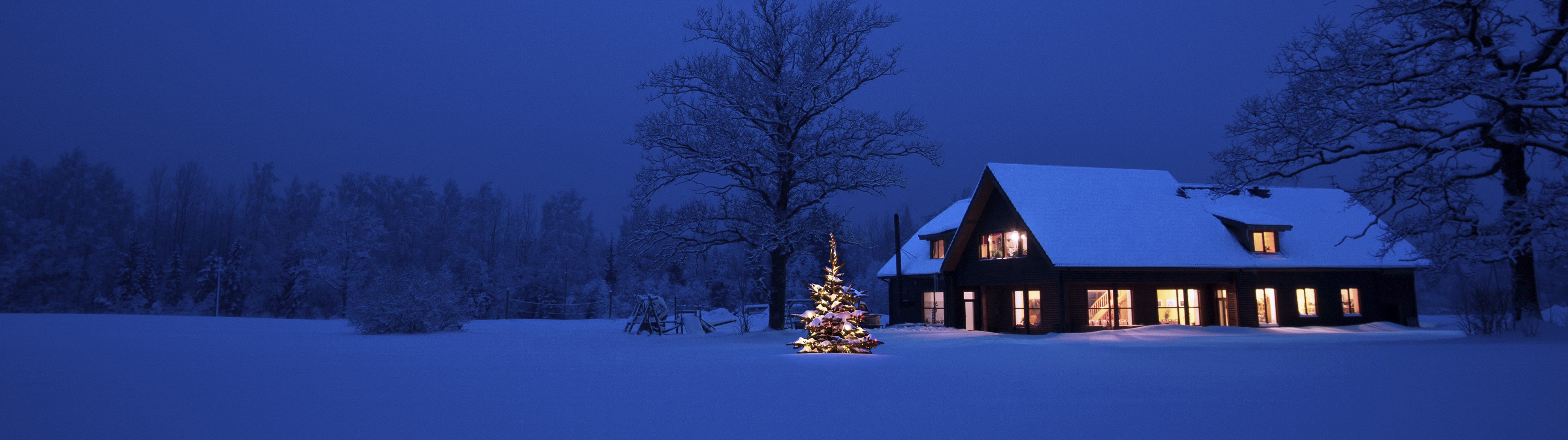 Christmas Tree And Cozy House With Snow Outside 4k Wallpaper