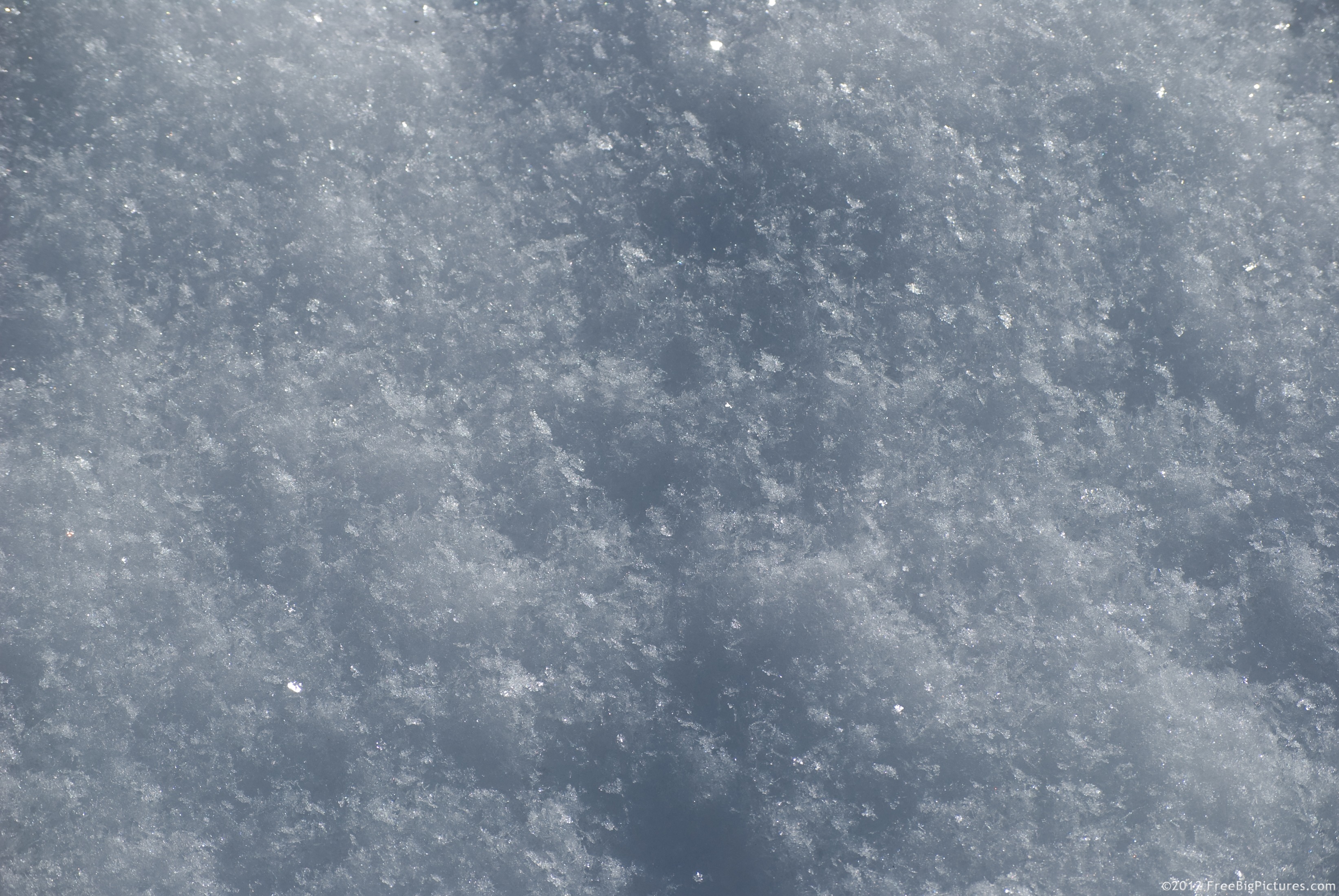 Background With Light And Shaded Portions On Snow