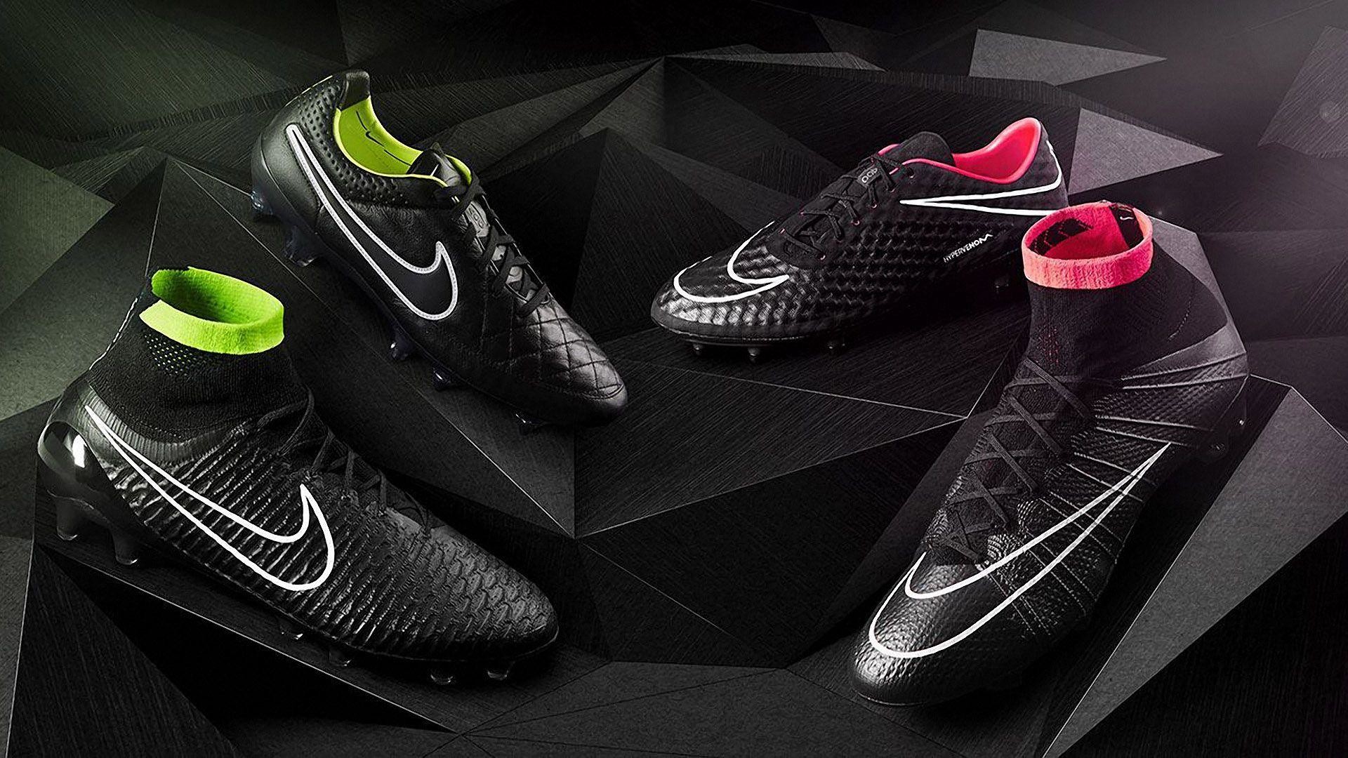 Four pairs of Nike football boots, in black, arranged on a black, geometric background