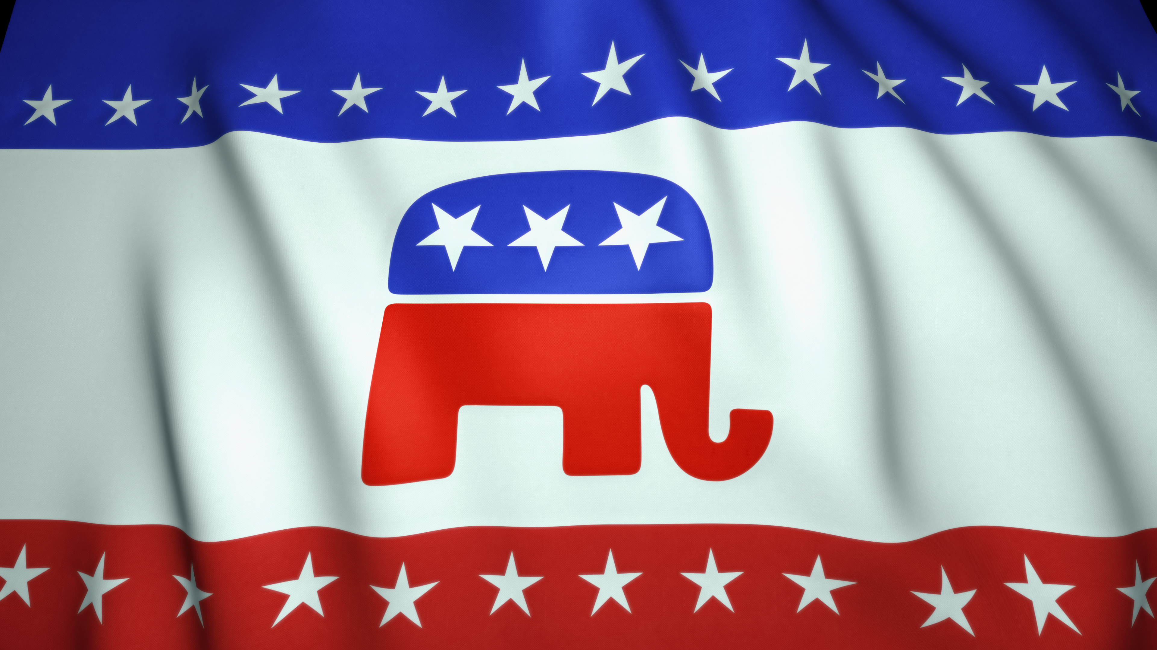 A waving Republican Party flag with the iconic red, white, and blue elephant logo