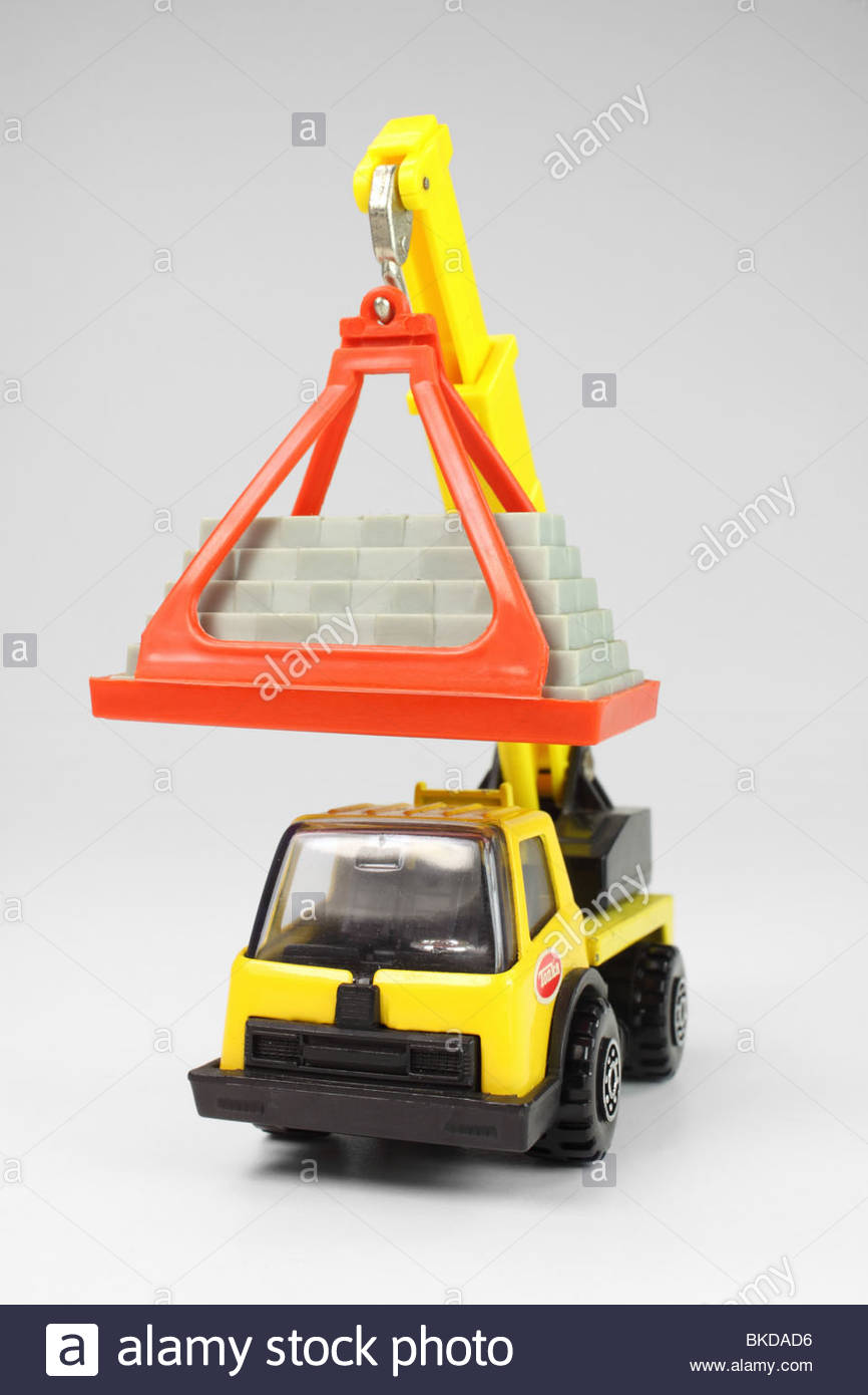 Tonka Toy Crane With Load Of Bricks On White Background Stock
