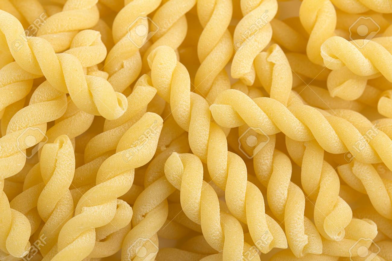 Close Up Of A Background Spiral Pasta Stock Photo Picture And