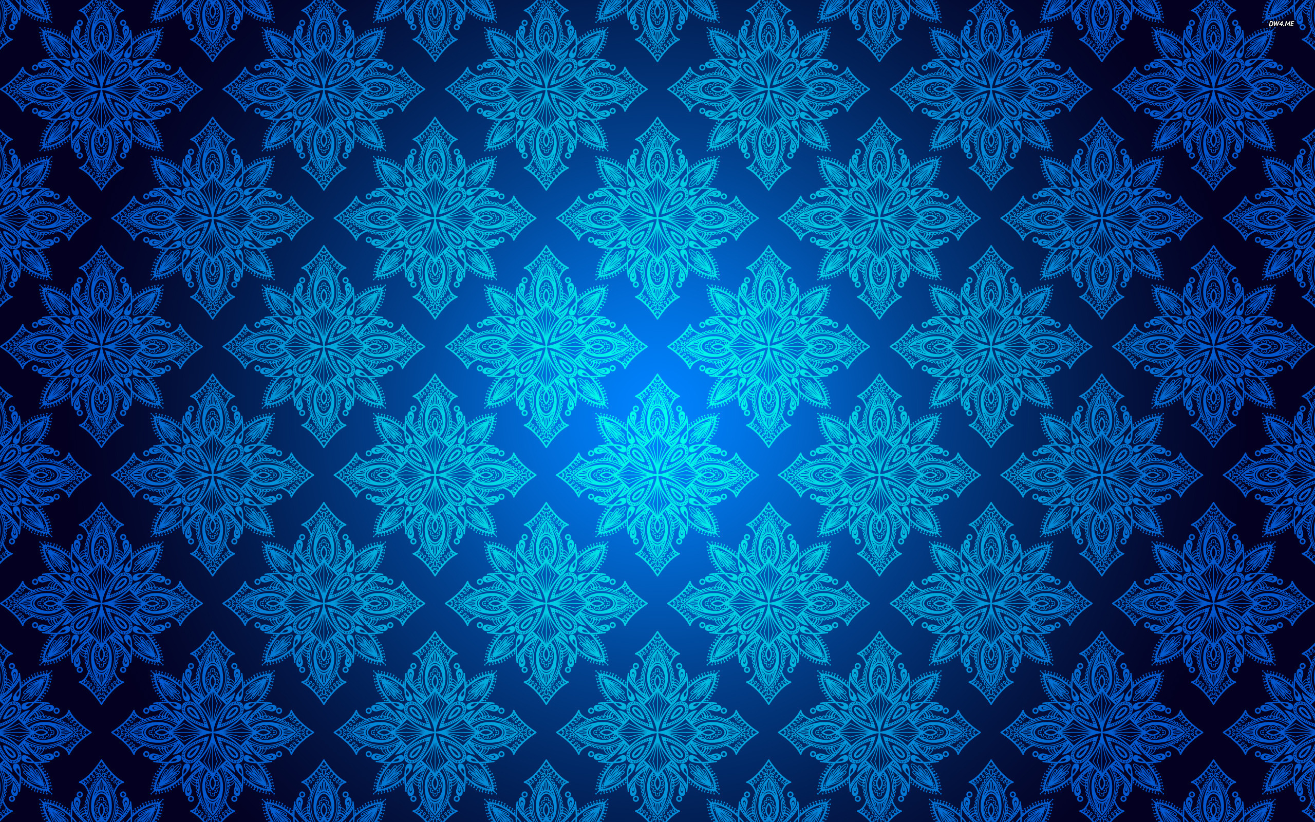 A seamless navy blue wallpaper with an intricate floral damask pattern