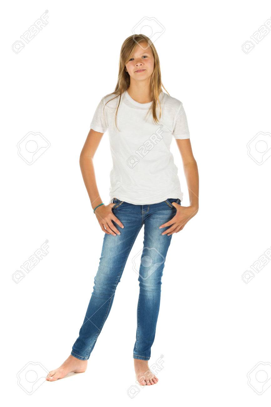 Young Girl Standing Barefoot With White T shirt And Blue Jeans