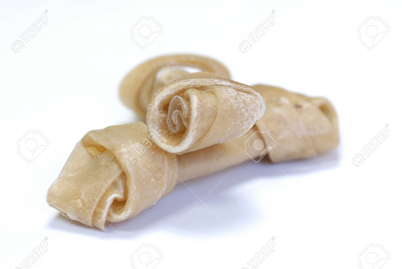 Free download Two Knotted Rawhide Bones On White Background Stock Photo