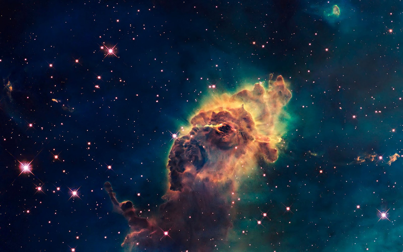 A breathtaking view of the Carina Nebula, a vast interstellar cloud of gas and dust located in the Carina-Sagittarius Arm of the Milky Way galaxy
