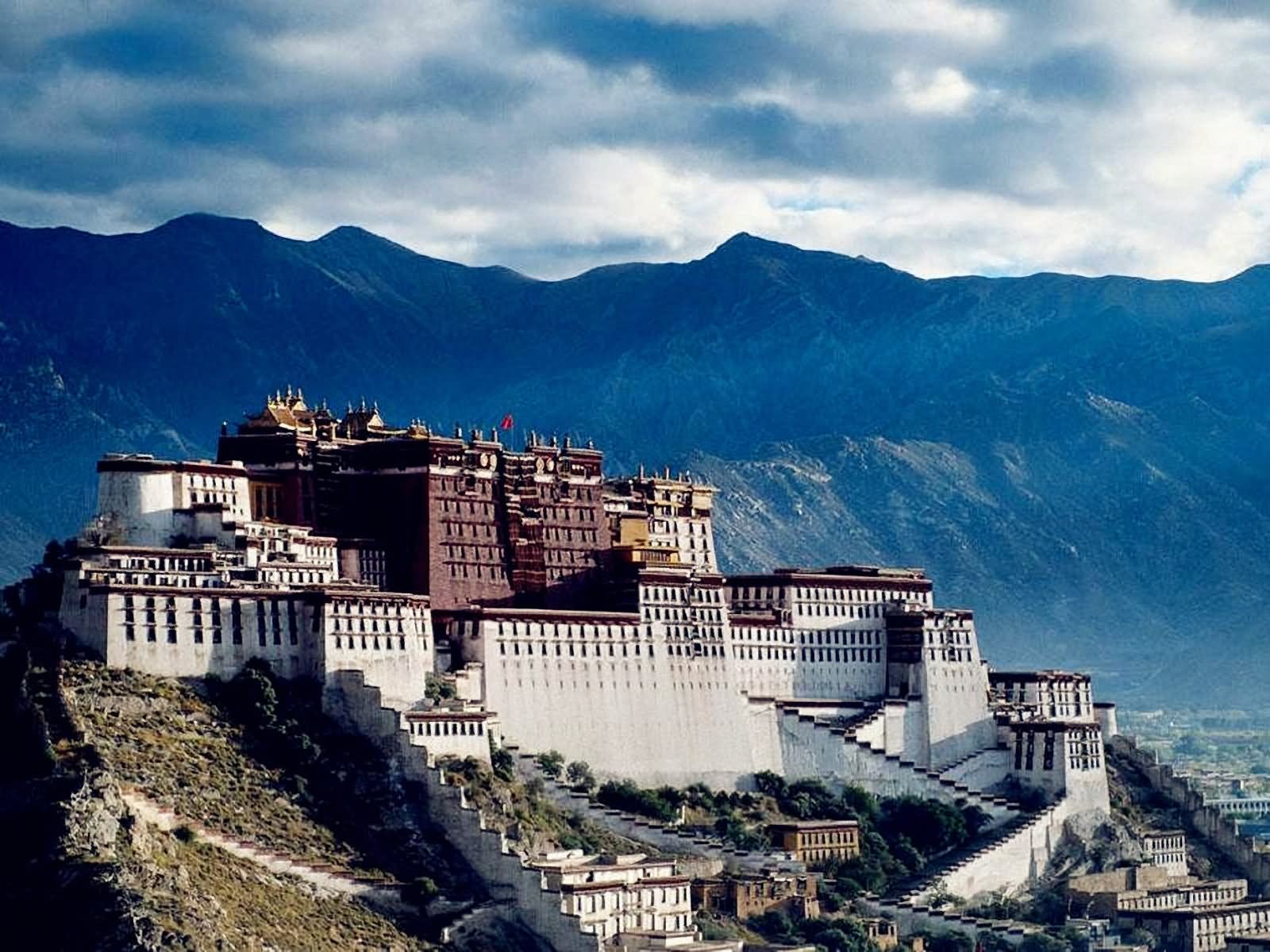 The Potala Palace On Bank Of Lhasa River In Tibet