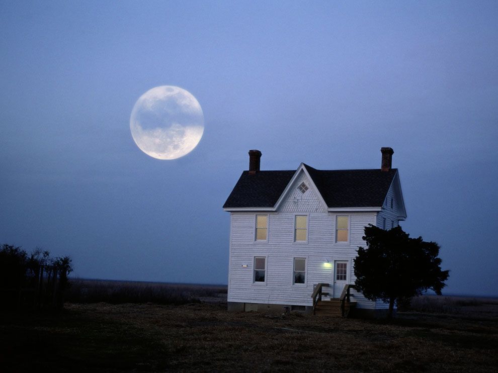  full moon rises over a building of the Chesapeake Bay Foundation