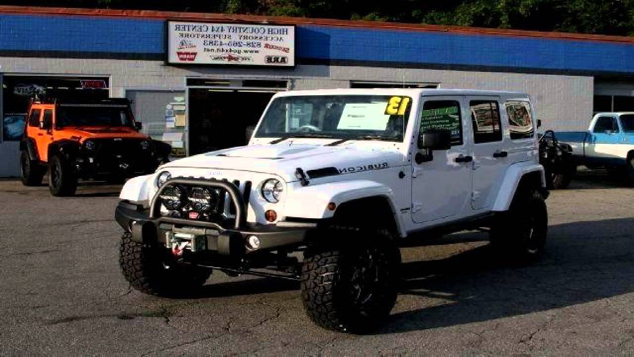 White Jeep Wrangler Unlimited Lifted