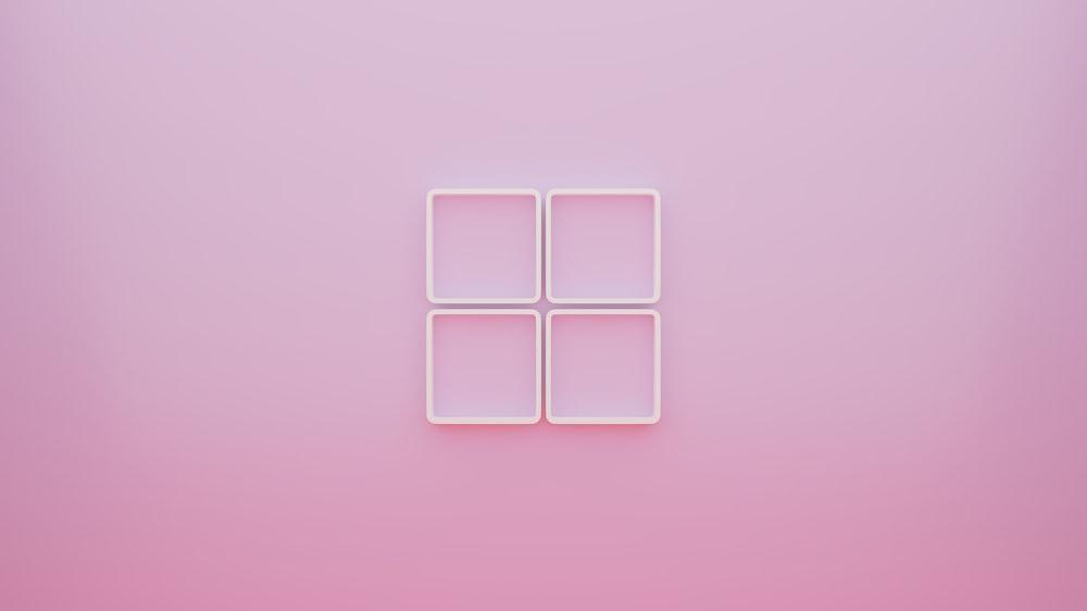 A Pink Background With Four Squares In The Middle Photo