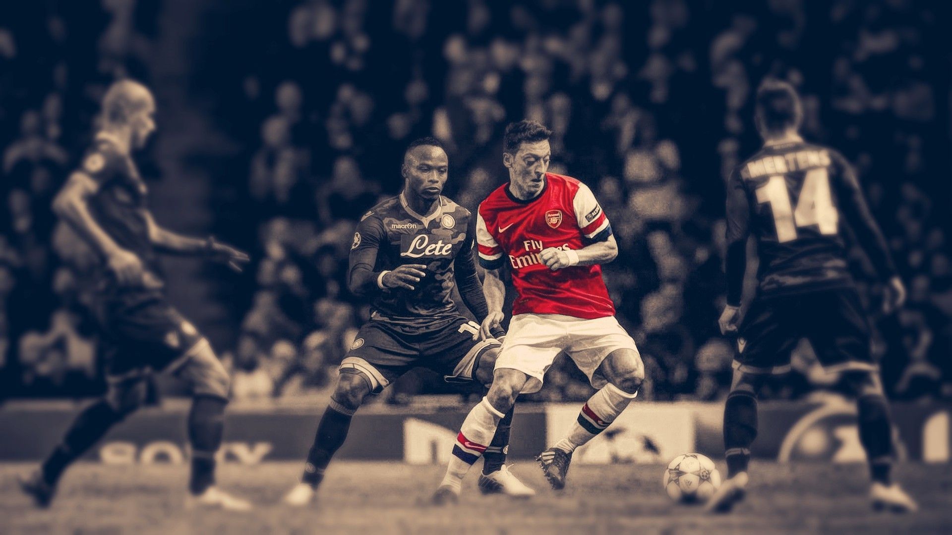 Mesut Özil dribbling past an opponent in a soccer match