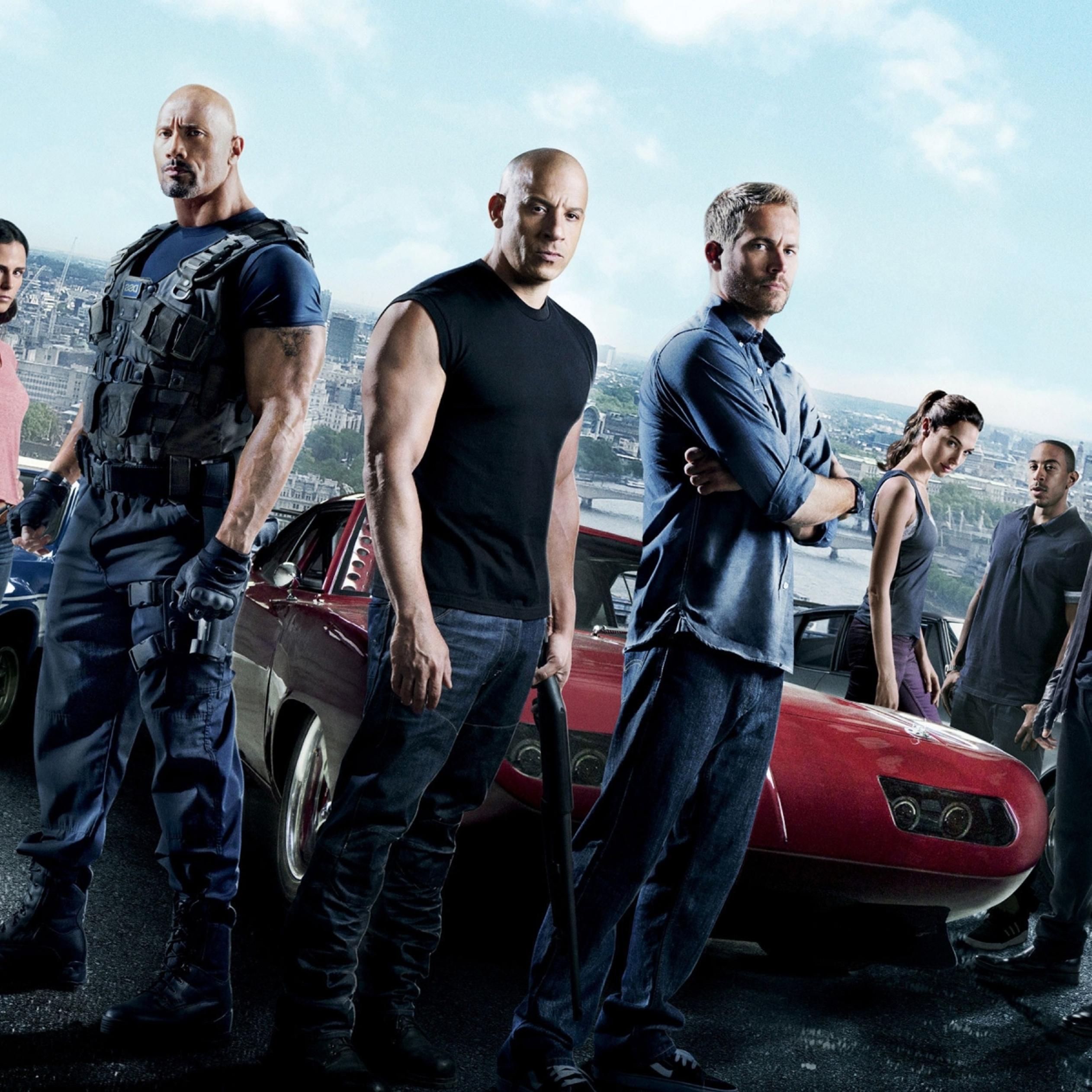 Promotional poster for Fast & Furious 6 featuring Dwayne Johnson, Vin Diesel, Paul Walker, and other cast members