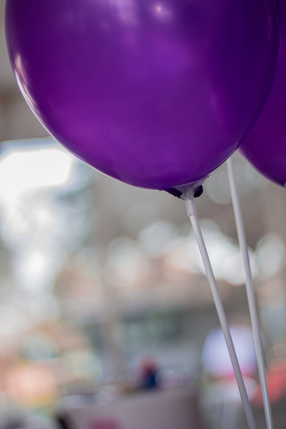 selective focus purple balloons photo Purple Image on Unsplash 1000x1500