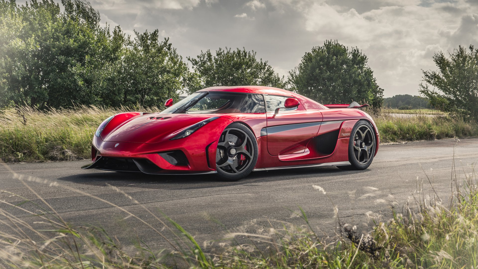 Red Koenigsegg Jesko on a Road