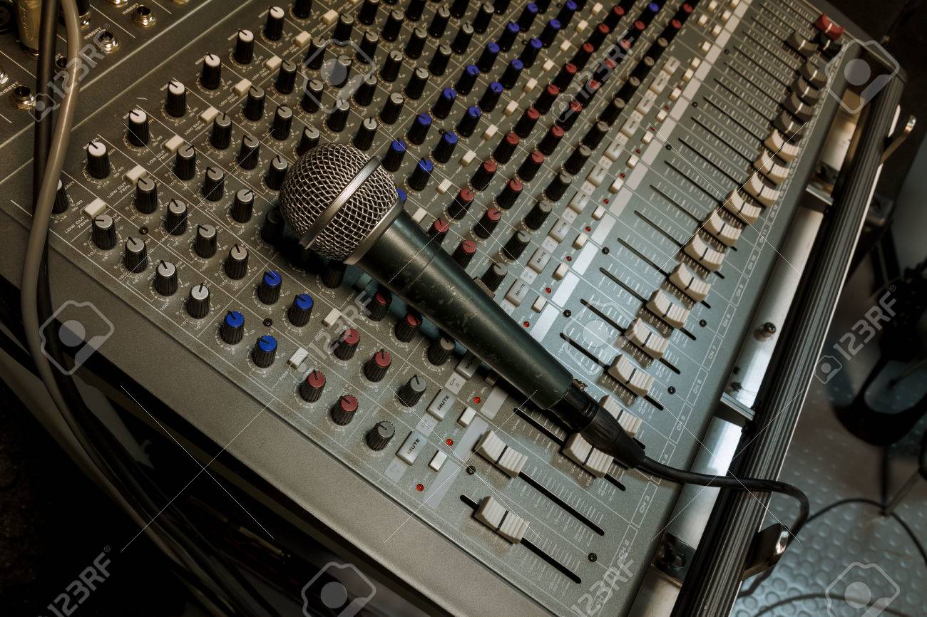 Microphone On Sound Mixer Background Stock Photo Picture And