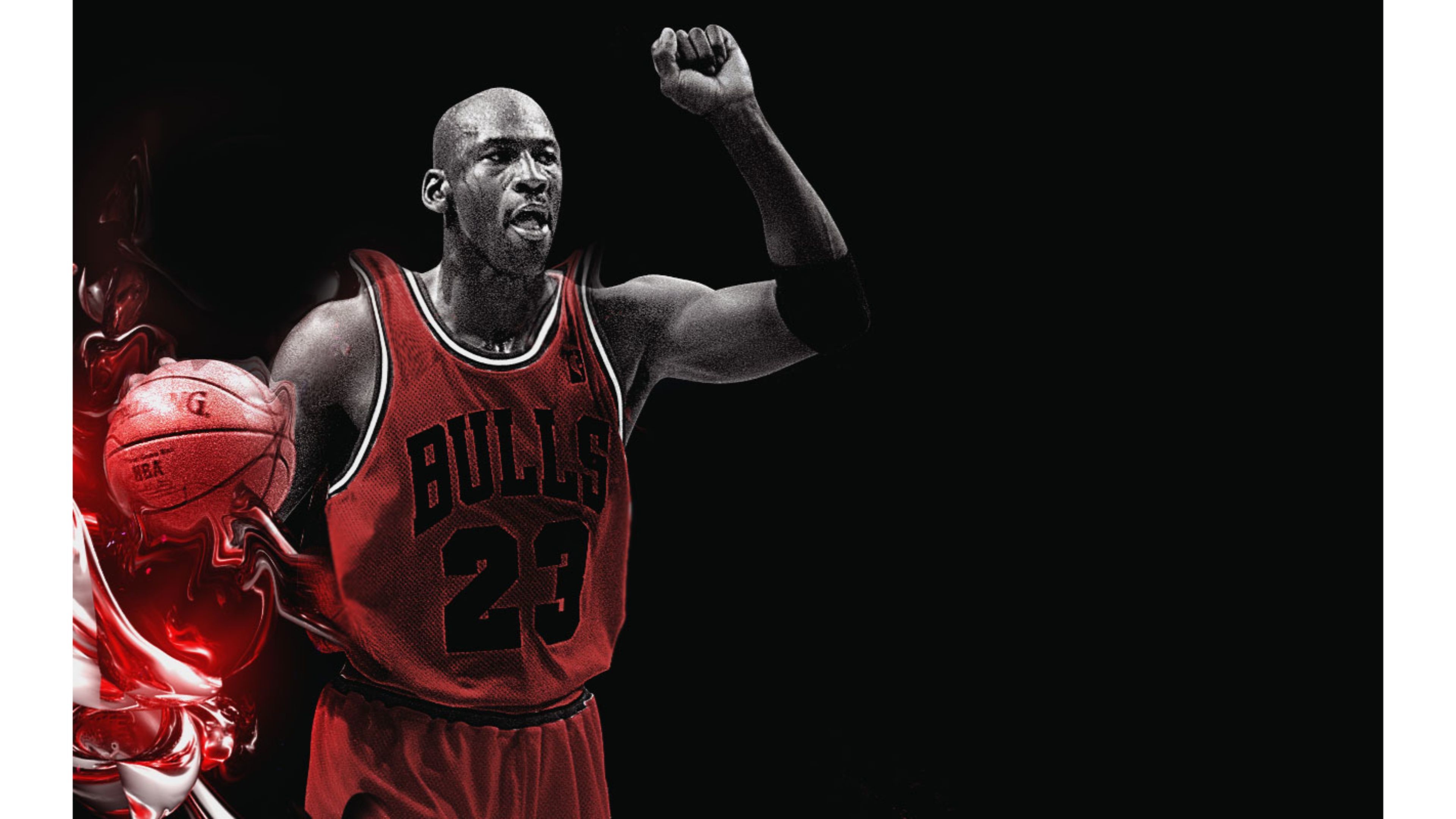 Michael Jordan raises his fist in victory while wearing his iconic Chicago Bulls jersey