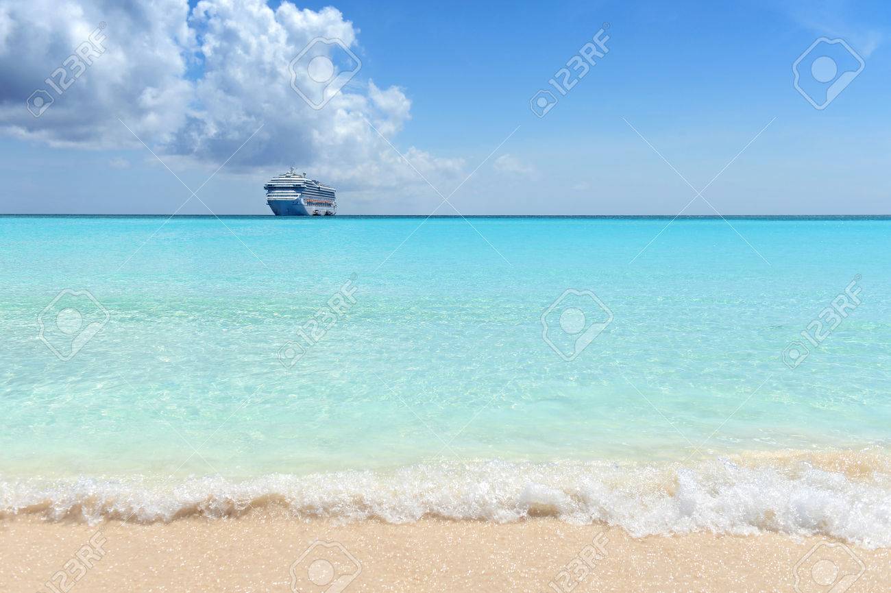 Caribbean Beach With Passenger Cruise Ship In Background Stock