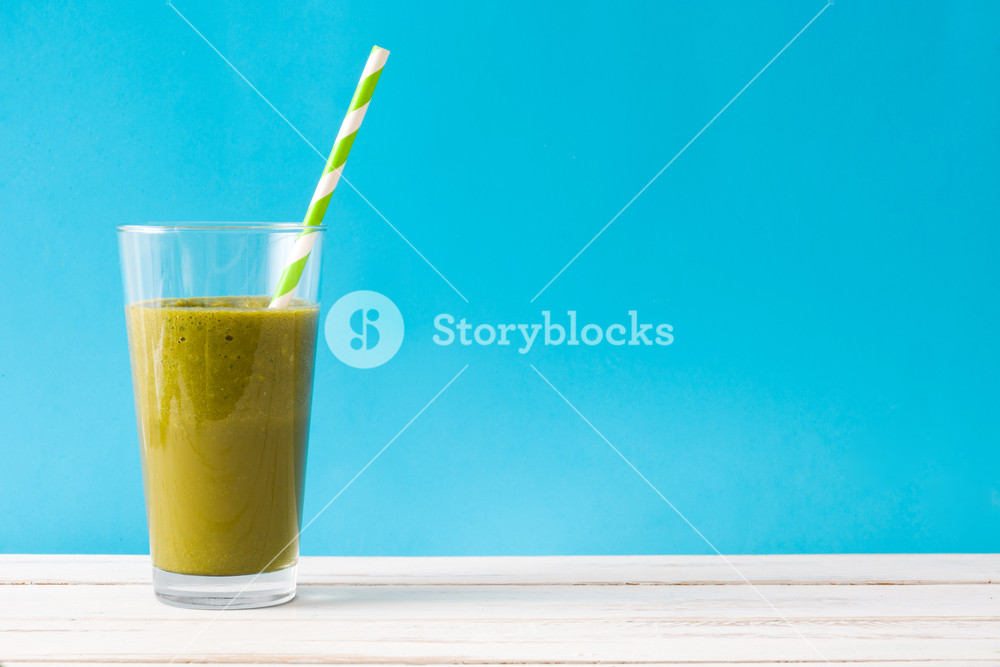 Healthy Green Detox With Spinach On Blue Background Royalty