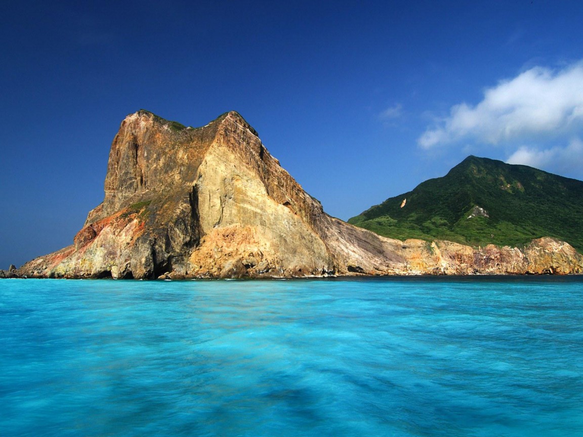Beautiful Beach With Giant Rocks Windows 8 Wallpaper HD