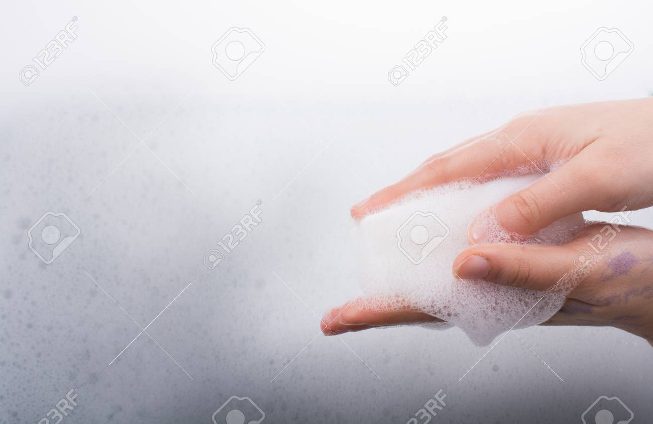 Hand Washing And Soap Foam On A Foamy Background Stock Photo