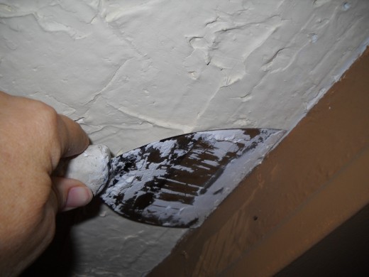 Plastering angle This is using plaster on a popcorn ceiling