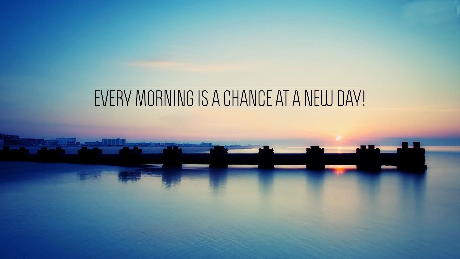 Motivational quote against a serene sunrise over calm water: 
