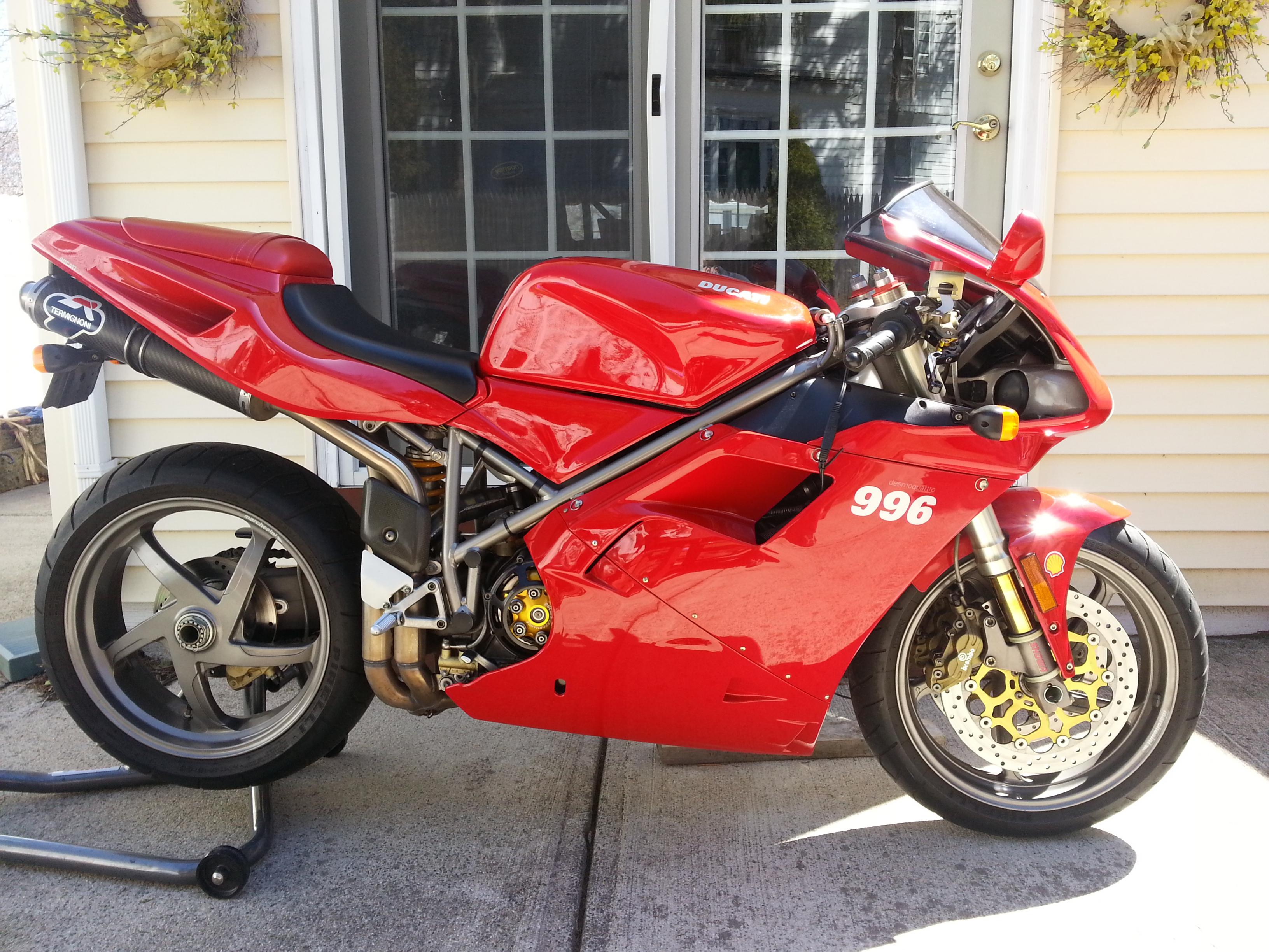 Red Ducati 996 Motorcycle parked outdoors