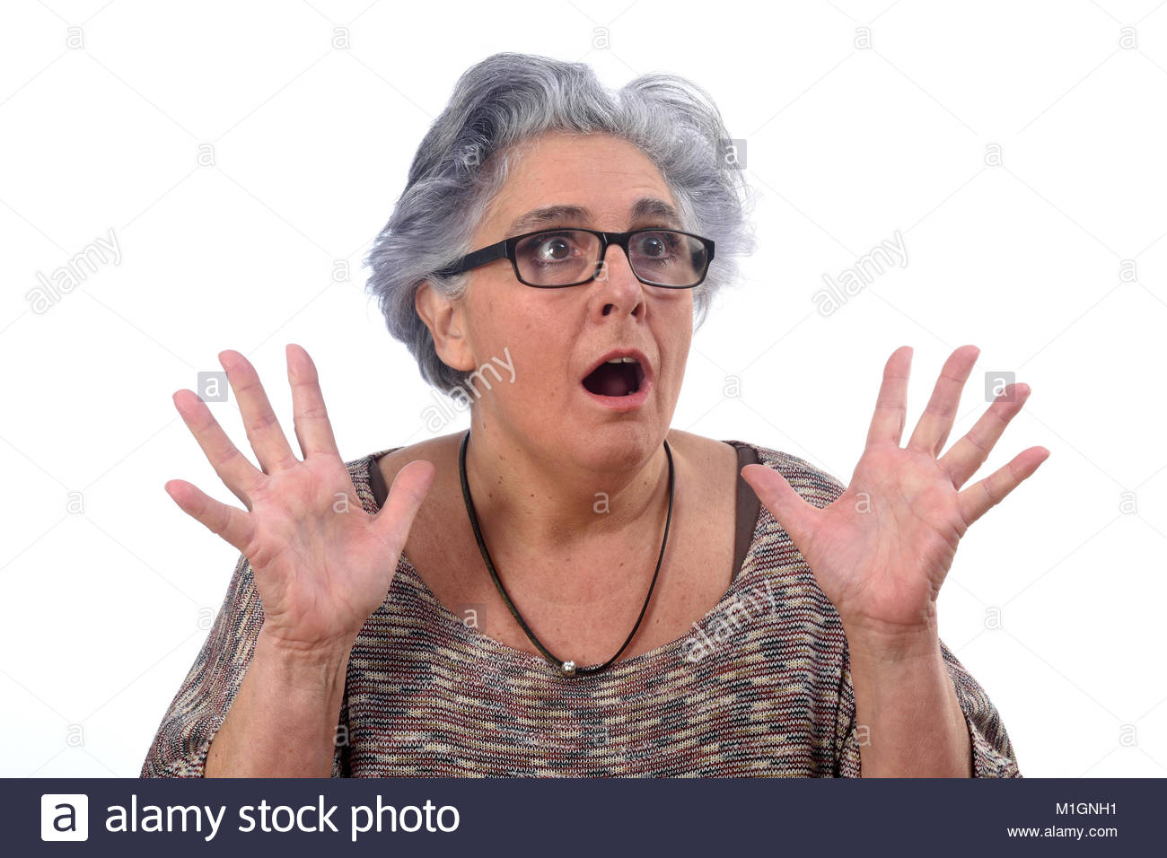 Surprised Woman On White Background Stock Photo