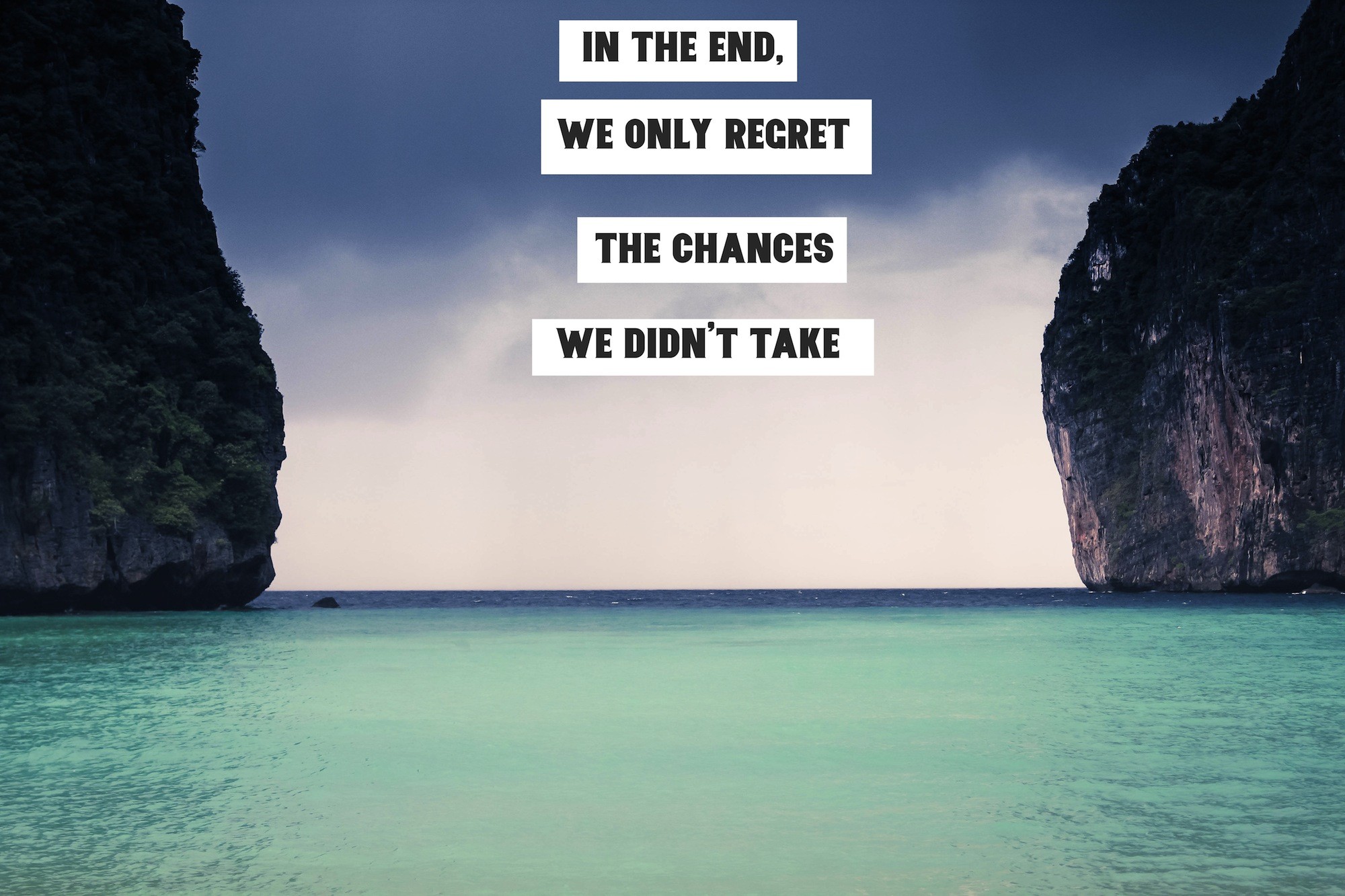 Motivational quote about taking chances, overlaid on a serene beach scene with cliffs