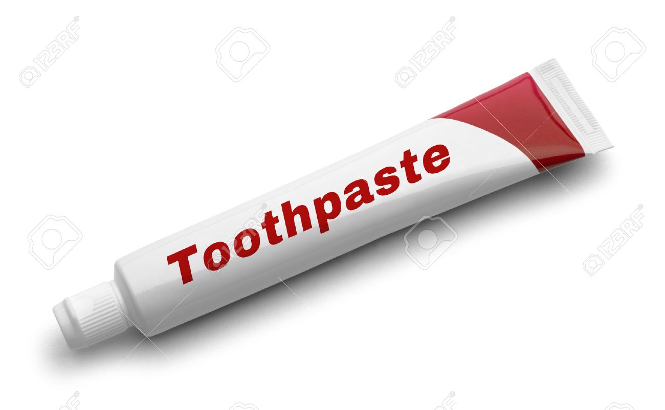 Red Tube Of Toothpaste Isolated On White Background Stock Photo