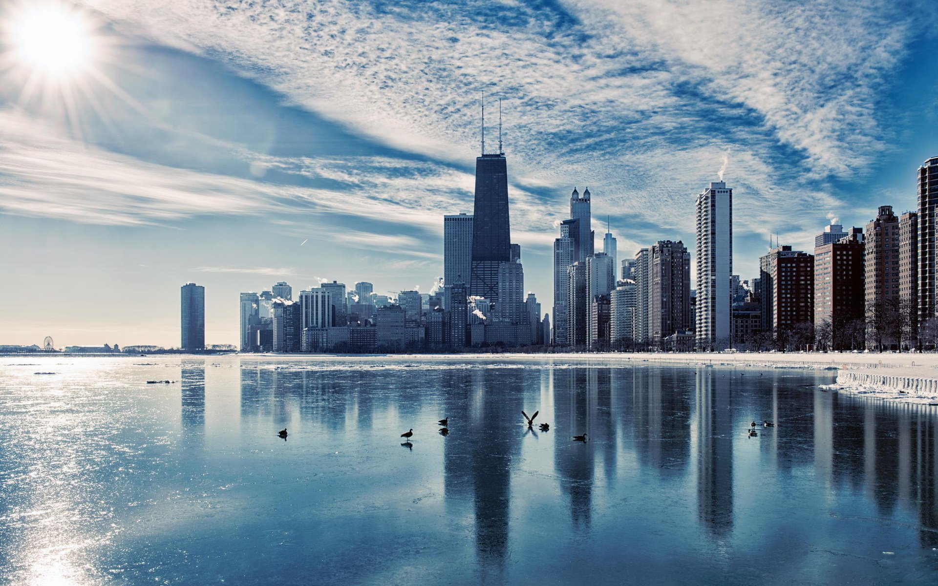 Chicago skyline in winter with icy lake