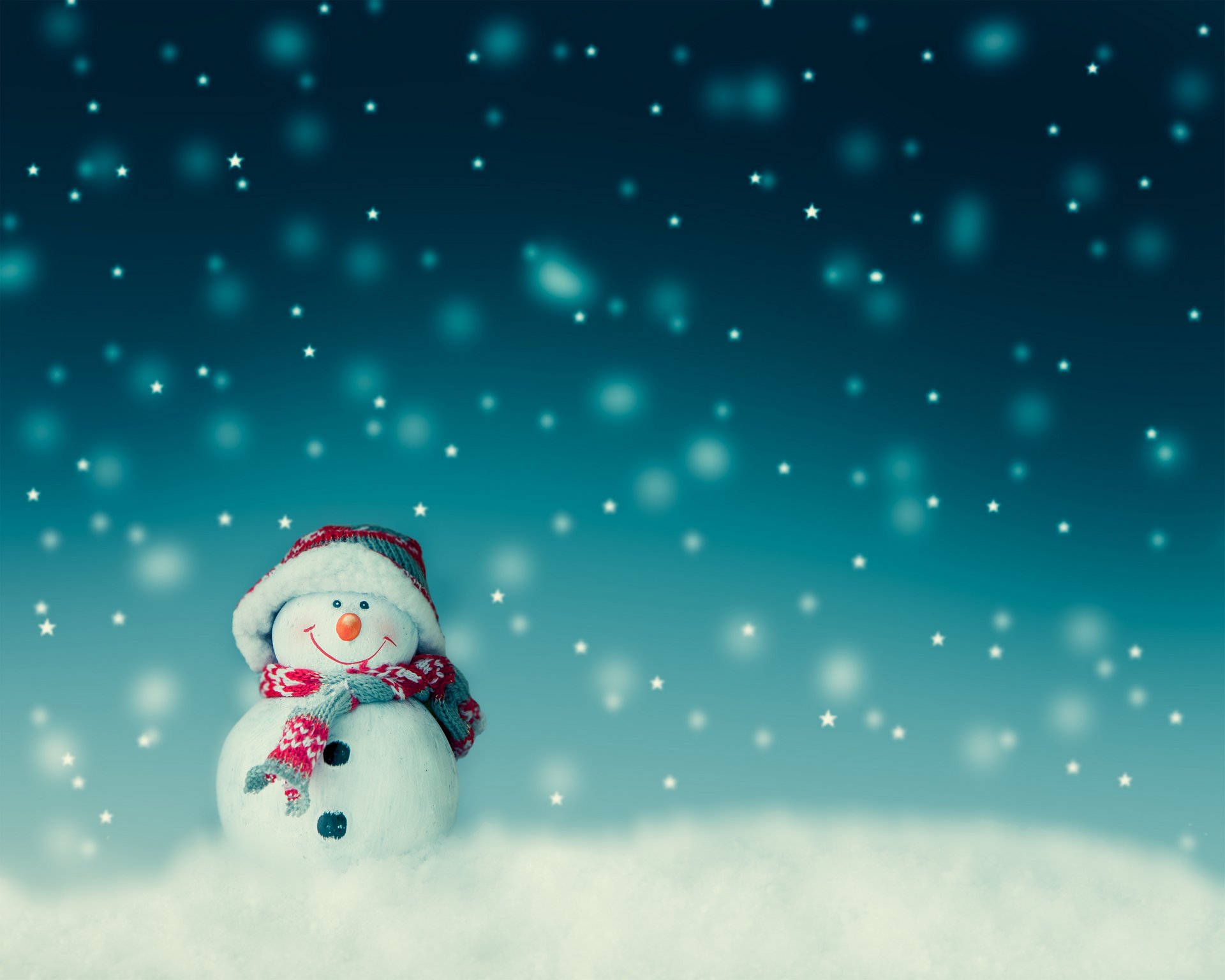 A cheerful snowman stands against a snowy, star-lit backdrop. The perfect winter scene